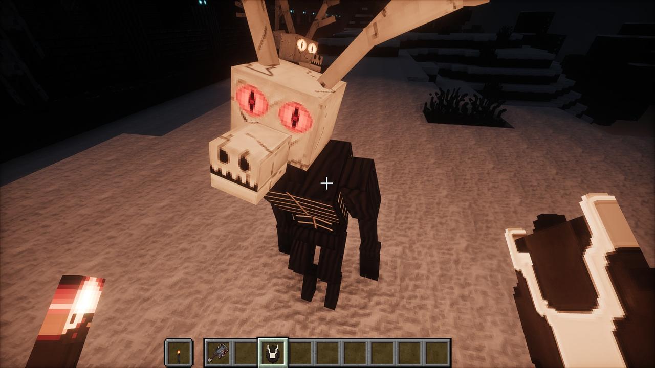 The Antlerkin on snow at night: a deer's skull with burning red eyes and antlers, on a black body