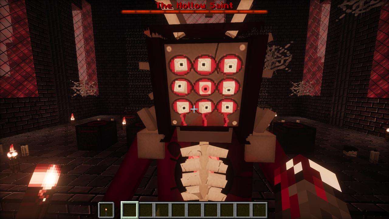 The Hollow Saint up close, its boss bar at the top of the screen: an iron grid of nine eyes over raw flesh, robes of blood red